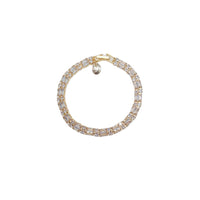 Cubic Zirconia Tennis Bracelet in gold plated metal with clear baguette-cut stones and a lobster clasp