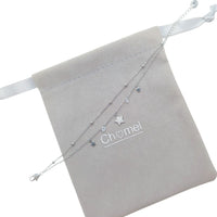 Planet Cubic Zirconia bracelet in silver-toned metal, featuring layered chains and dangling star charms.