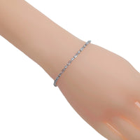 Cubic Zirconia Tennis Bracelet in silver-tone metal with a single row of sparkling baguette-cut stones
