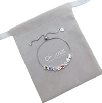 Cubic zirconia tennis bracelet with colourful square stones and adjustable sliding rhodium plated band