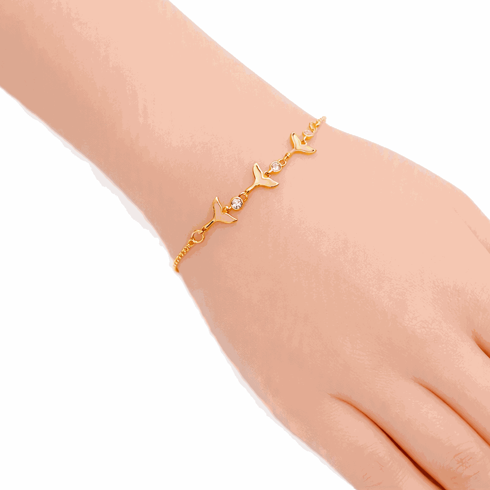 Cubic Zirconia Tennis Bracelet in gold-plated metal with three mermaid tail charms and sparkling stones, adjustable fit
