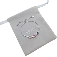 Colorful cubic zirconia tennis bracelet with adjustable sliding design and rhodium plated finish