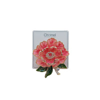 Cubic Zirconia Brooch with layered pink enamel petals, gold edging, sparkling central stones and dark green leaves.