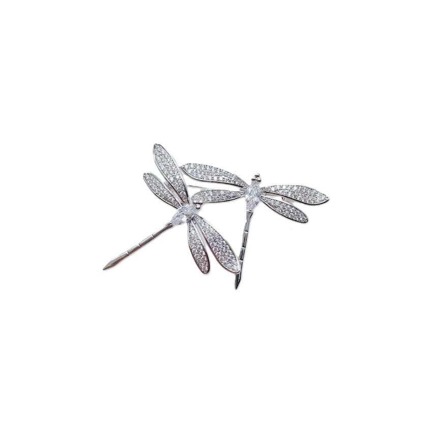 Two dragonfly cubic zirconia brooch with rhodium plating and C clasp closure, size 5.9cm x 3.4cm