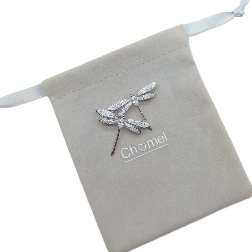 Elegant rhodium plated dragonfly cubic zirconia brooch with two dragonflies and C clasp closure