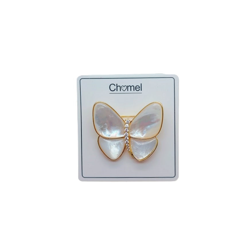 Butterfly Mother of Pearl Brooch with iridescent white inlay, gold-tone edging and a row of sparkling stones at the centre.