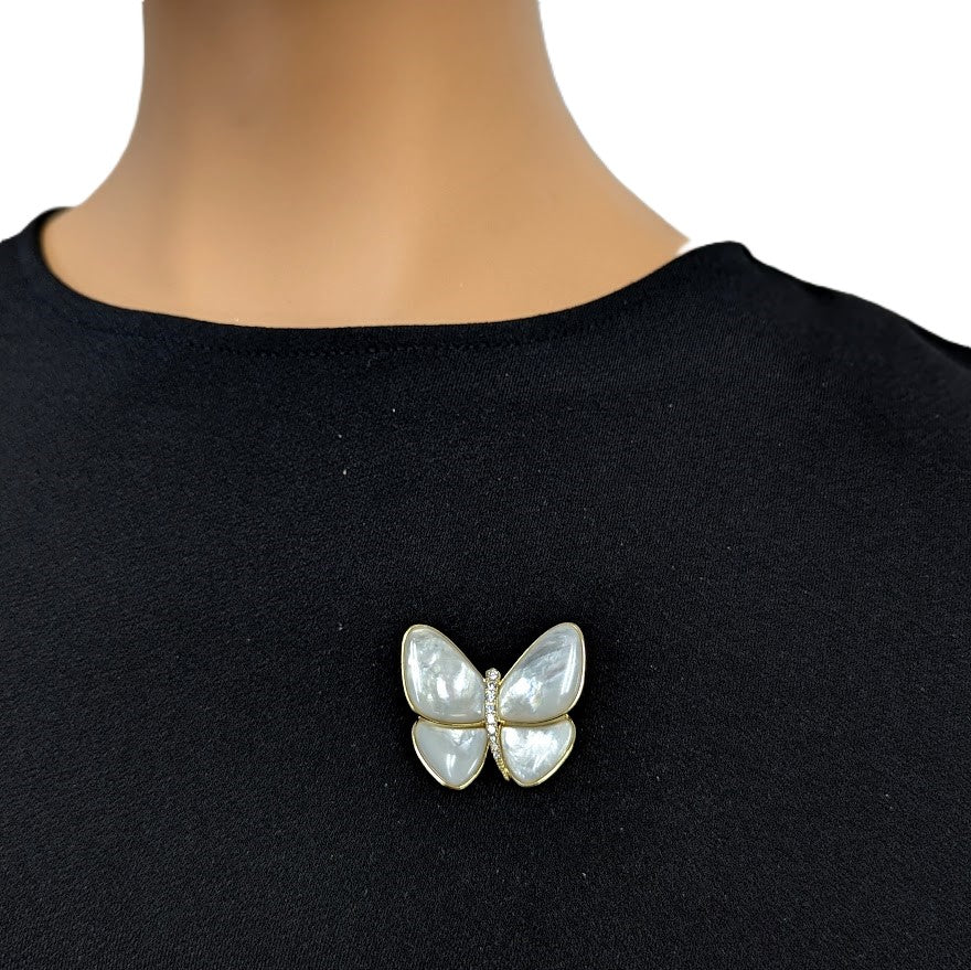 Butterfly Mother of Pearl Brooch with iridescent white inlay, gold-tone edging and a sparkling central accent.