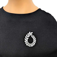 Cubic Zirconia Brooch in a silver-tone finish, featuring a sparkling oval wreath of leaf-shaped stones.