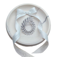 Cubic Zirconia Brooch in a silver-tone leafy wreath design, with clear stones and a delicate pin fastening.