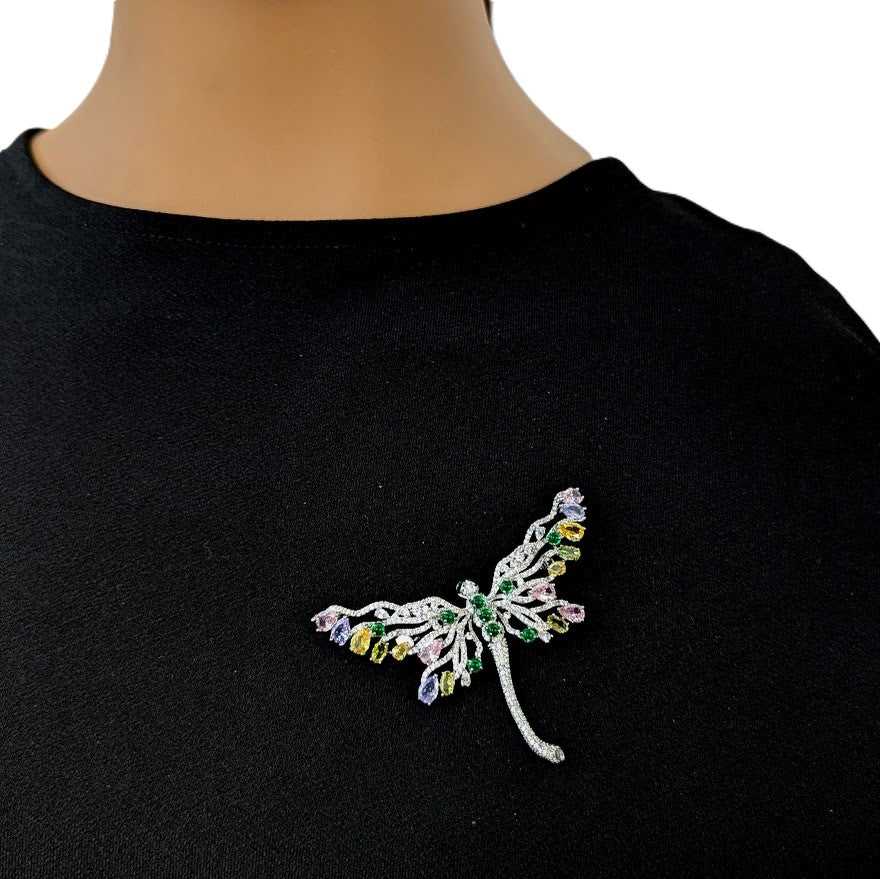 Dragonfly cubic zirconia brooch in silver-tone metal, featuring sparkling clear stones and multicoloured accents.