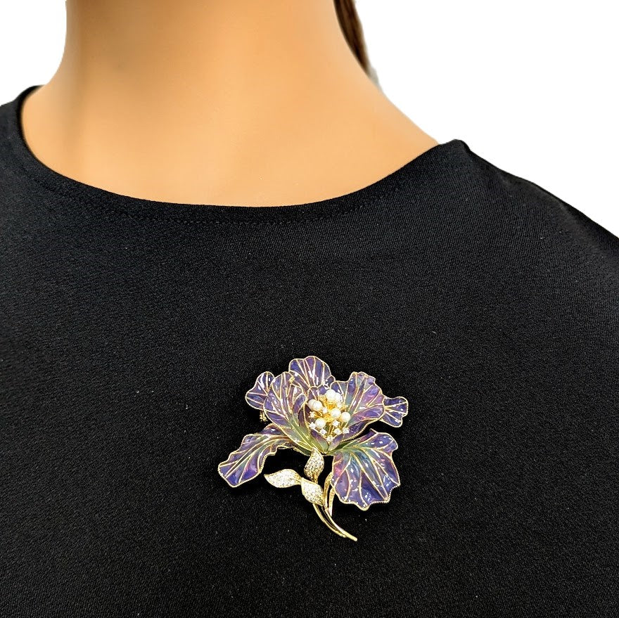 Flower Cubic Zirconia Brooch in purple and gold-tone metal, with translucent enamel petals, sparkling stones and a leafy stem.
