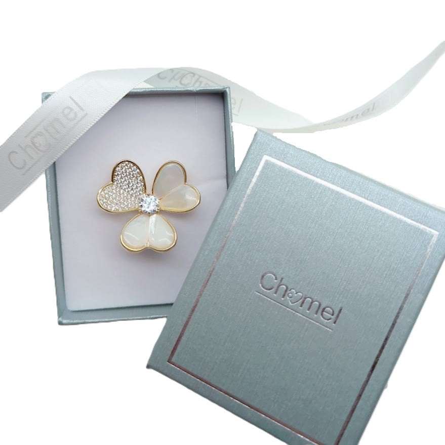 Gold plated 3 leaf clover brooch with cubic zirconia and mother of pearl accents