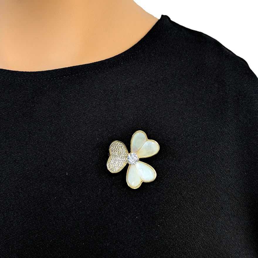 Gold-plated 3 leaf clover brooch with cubic zirconia and mother of pearl accents