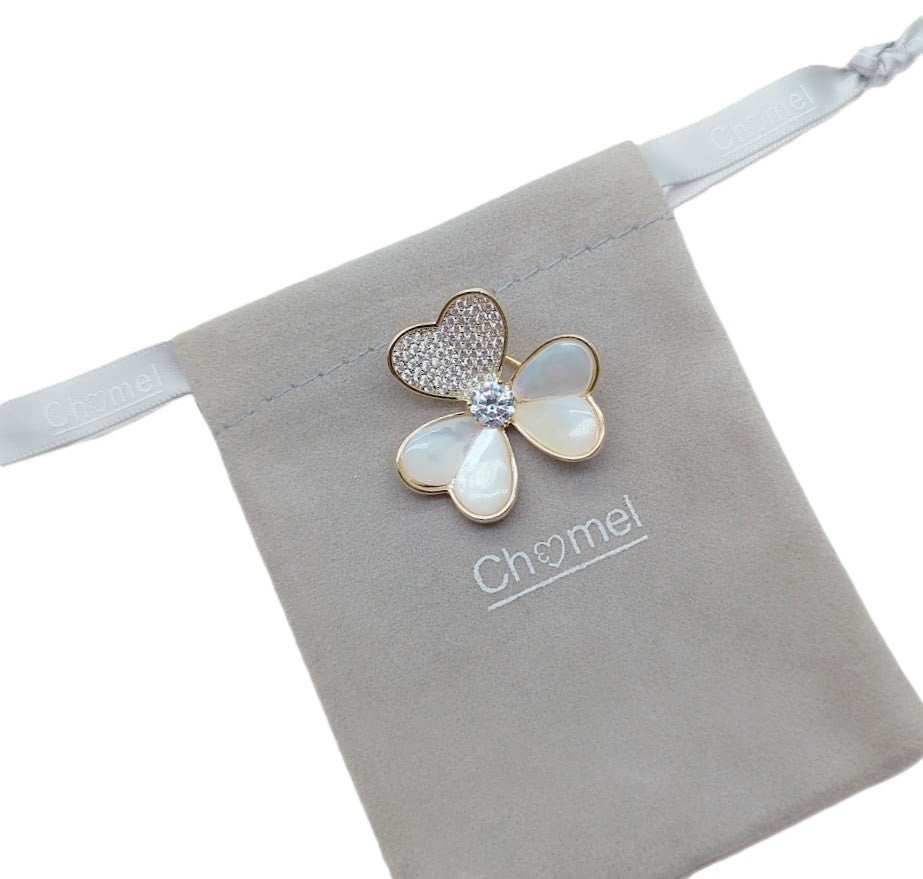 Gold-plated 3 leaf clover brooch with cubic zirconia and mother of pearl accents