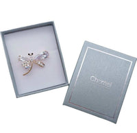 Gold plated dragonfly cubic zirconia brooch with single flower accent and C clasp closure