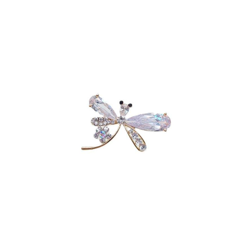 Gold plated dragonfly cubic zirconia brooch with single flower accent and C clasp closure