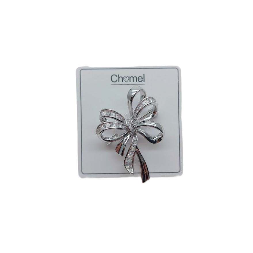 Elegant rhodium plated ribbon cubic zirconia brooch with fluid design and C clasp closure