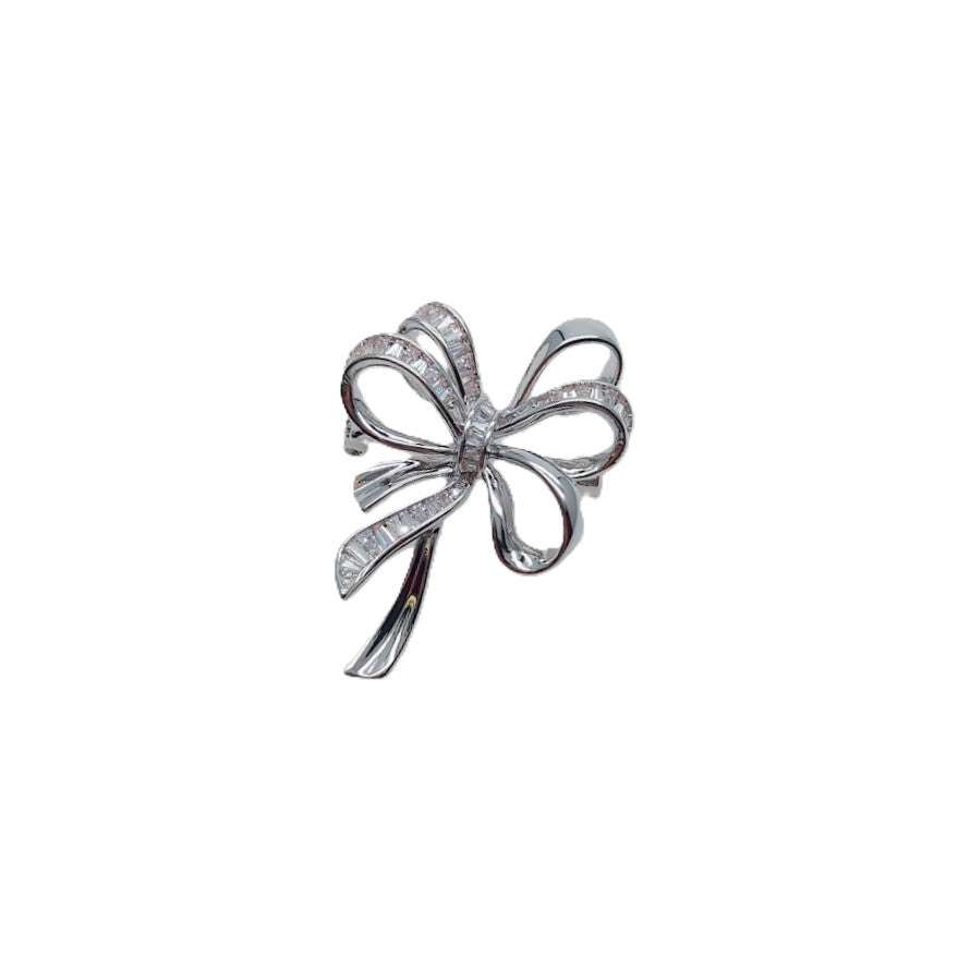 Elegant ribbon cubic zirconia brooch with rhodium plating and pin clasp closure