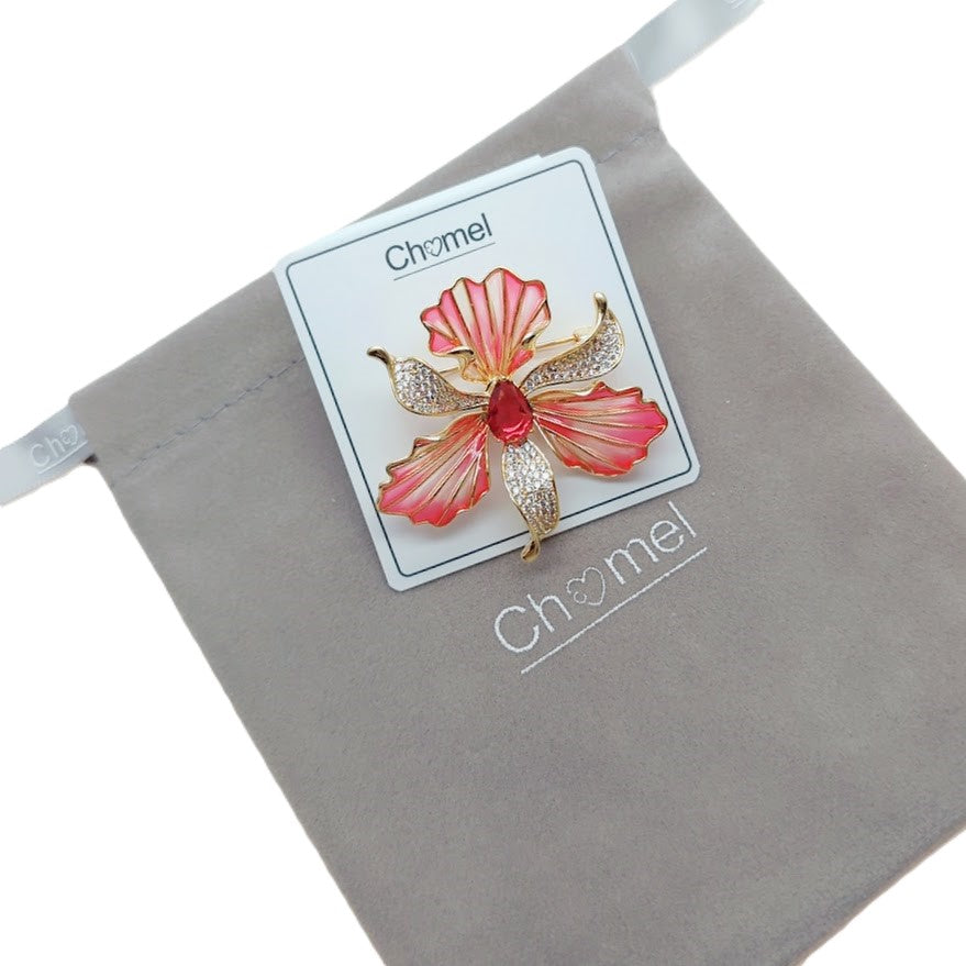 Cubic Zirconia Brooch featuring a pink and red enamel orchid with gold-tone accents and sparkling clear stones.