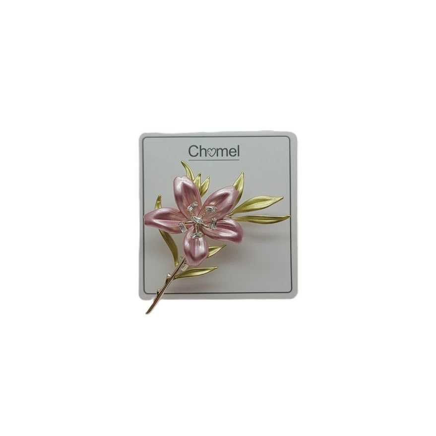 Cubic Zirconia Brooch with a pink enamel flower, clear sparkling accents, and slender gold-tone leaves and stem.