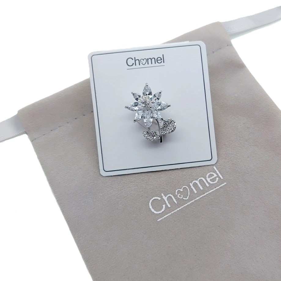 Elegant flower cubic zirconia brooch with rhodium plating and C clasp closure, perfect for layering on clothing and accessories