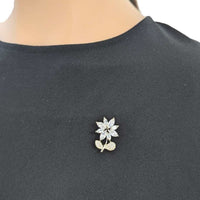 Gold plated flower cubic zirconia brooch with elegant floral design and C clasp closure