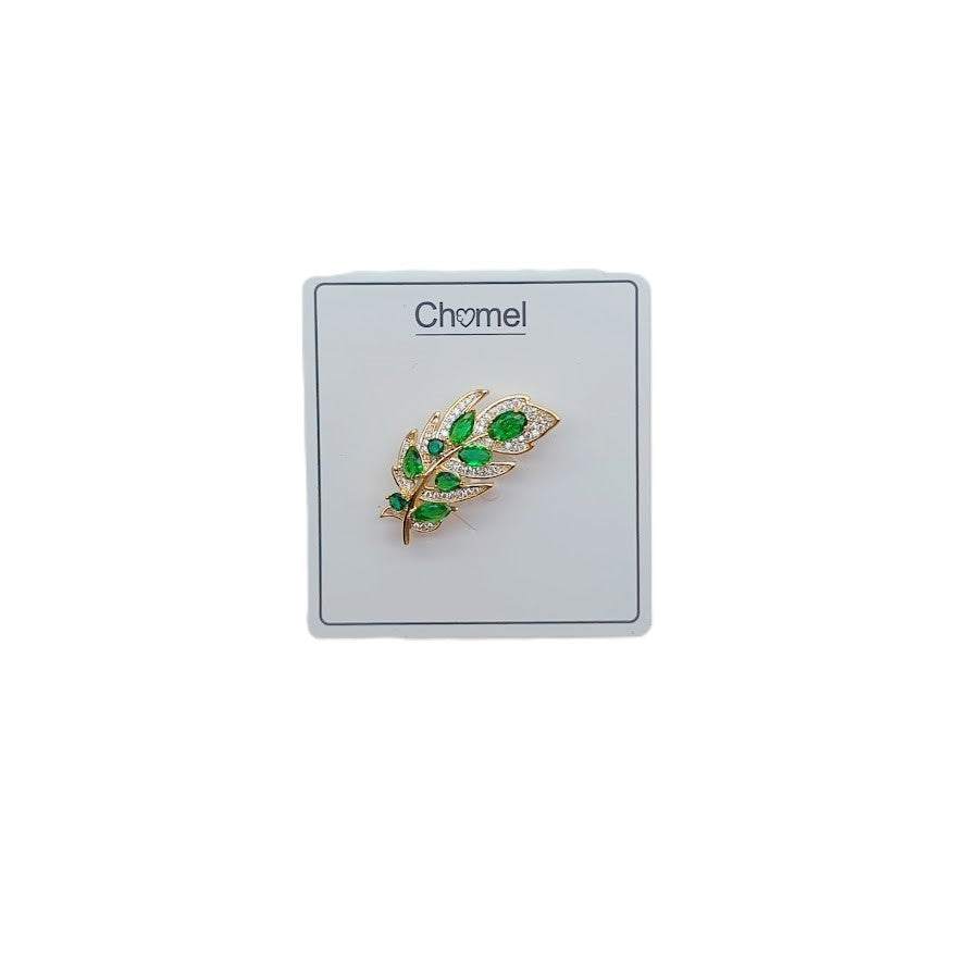 Gold plated maple leaf cubic zirconia brooch with green stones and C clasp closure