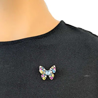 Gold plated butterfly cubic zirconia brooch with vibrant coloured stones and pin clasp closure