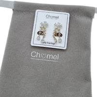 Gold-plated flower cubic zirconia clip-on earrings with dangling solitaire and silicone-padded backings