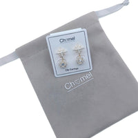 Gold plated starburst cubic zirconia clip-on earrings with faceted ball drop, 2.6cm length