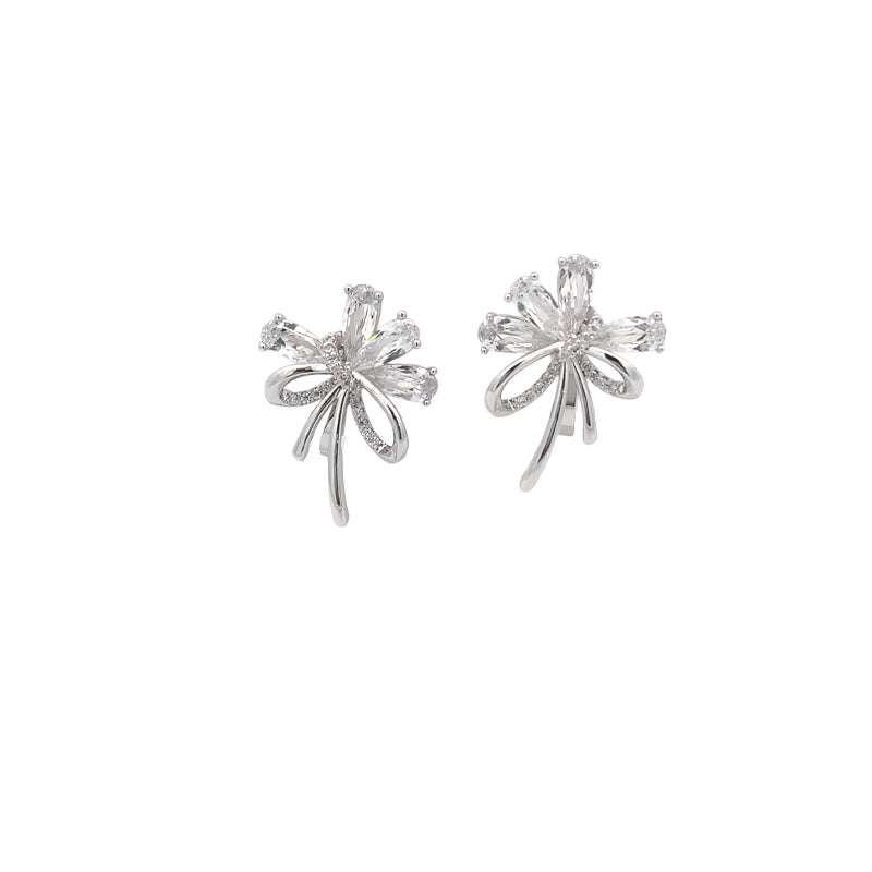 Cubic zirconia flower bouquet clip-on earrings with ribbon detailing and rhodium-plated finish
