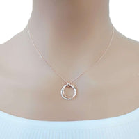 Interlocking cubic zirconia necklace with three rosegold-plated rings pendant on adjustable chain