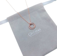 Elegant rosegold plated interlocking cubic zirconia necklace with three 15-16mm rings on adjustable chain