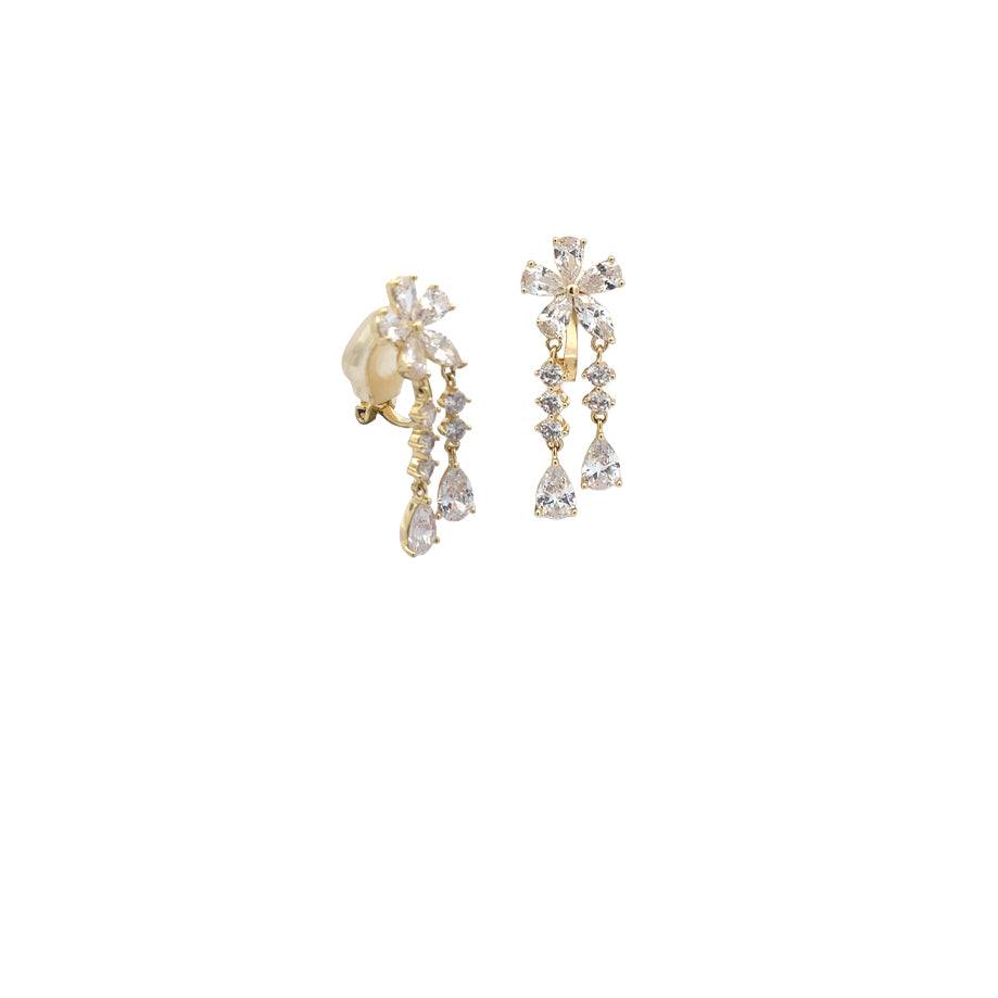 Flower cubic zirconia clip-on earrings with gold-plated flower design and dangling solitaire stones