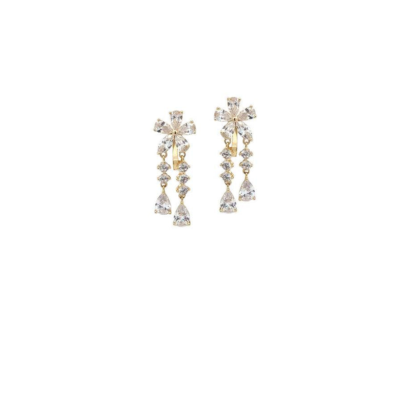 Gold-plated flower cubic zirconia clip-on earrings with dangling solitaire and silicone backings for comfort