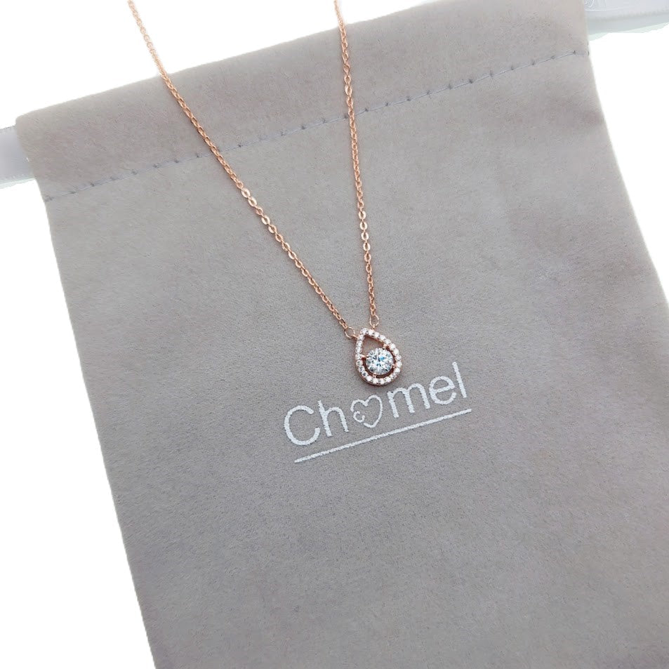 Rose gold teardrop cubic zirconia necklace with round solitaire pendant on adjustable chain