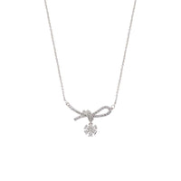 Ribbon cubic zirconia necklace with rhodium plated ribbon pendant and dangling solitaire stone