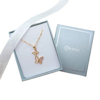 Butterfly Cubic Zirconia Necklace in gold-tone metal, with two butterfly charms, one set with clear stones and pale pink accents.