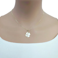 Gold-tone necklace with a four-leaf clover pendant featuring pearly white insets and sparkling stones; Butterfly Cubic Zirconia detail.