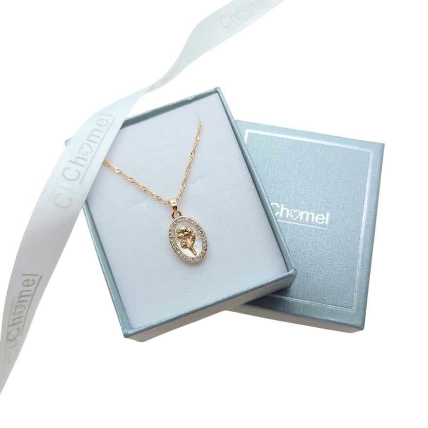 Gold-plated necklace with an oval mother-of-pearl pendant, flower motif and sparkling border; Butterfly Cubic Zirconia detail.