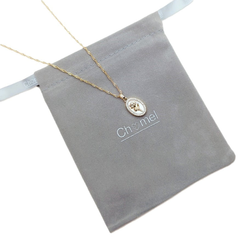 Gold-tone fine chain necklace with oval mother-of-pearl pendant, gold flower detail and sparkling border; Butterfly Cubic Zirconia style.