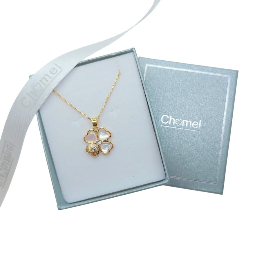 Clover pendant necklace with a gold-tone chain, four heart-shaped petals and a textured gold petal; Butterfly Cubic Zirconia accents.