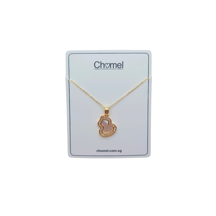 Gold-tone Dream Catcher Cubic Zirconia Necklace with a delicate chain and open heart-shaped pendant outlined in sparkling stones.