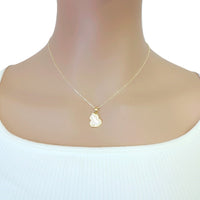 Gold-tone Dream Catcher Cubic Zirconia Necklace with a fine chain and small, white heart-shaped pendant with a sparkling border.
