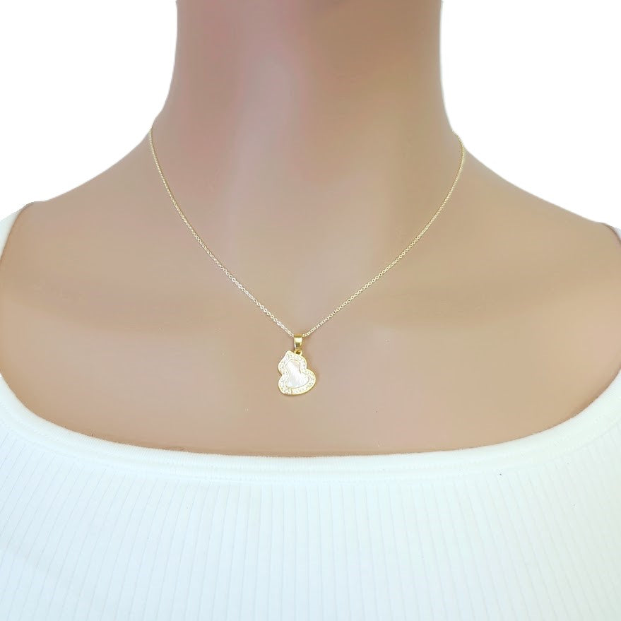 Gold-tone Dream Catcher Cubic Zirconia Necklace with a fine chain and small, white heart-shaped pendant with a sparkling border.