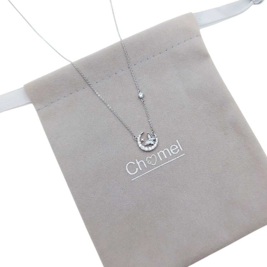 Moon and Butterfly Necklace with cubic zirconia moon and mother of pearl butterfly pendant on rhodium plated chain