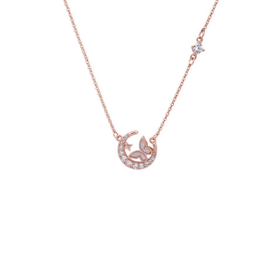 Moon and Butterfly Necklace with cubic zirconia moon and mother of pearl butterfly in rosegold finish