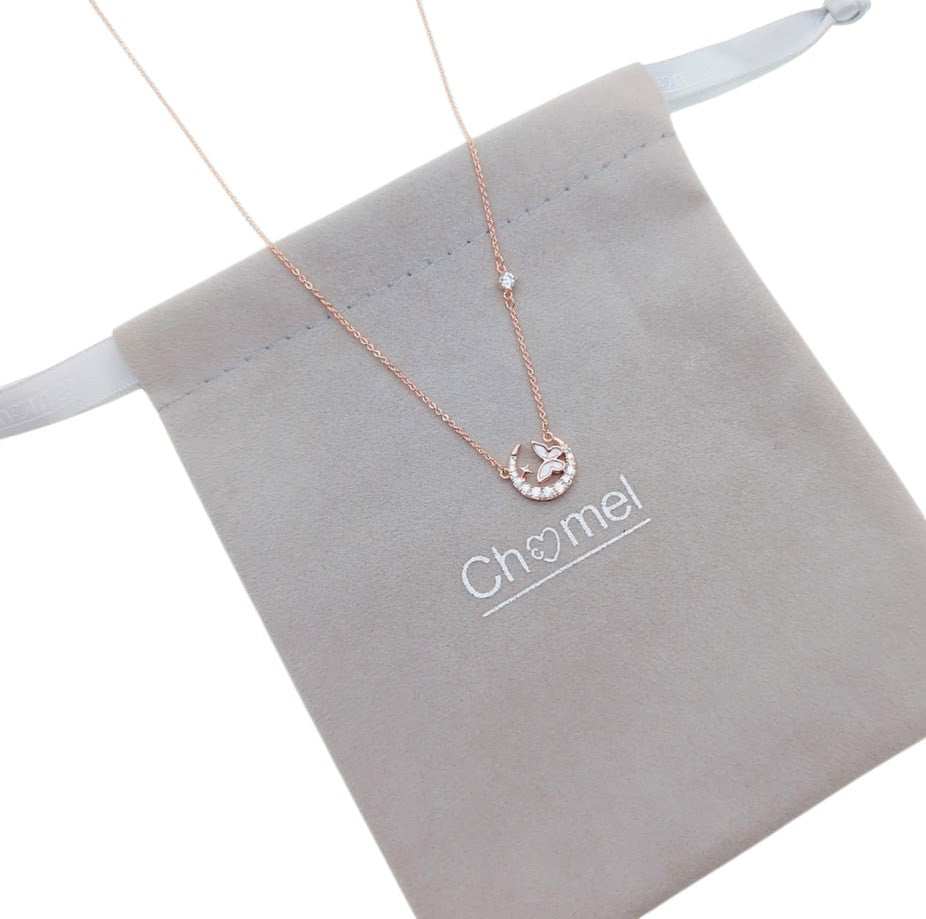 Moon and butterfly necklace with cubic zirconia and mother of pearl pendant in rosegold finish