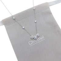 Elegant cubic zirconia necklace with three round solitaire pendants on a rhodium-plated chain