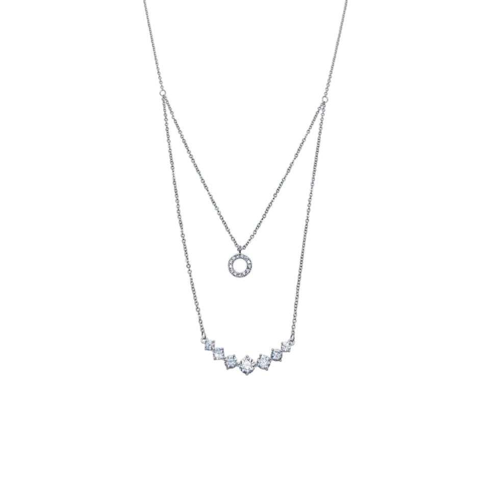 Tiered cubic zirconia necklace with round pendant and graduating solitaires on rhodium-plated chain